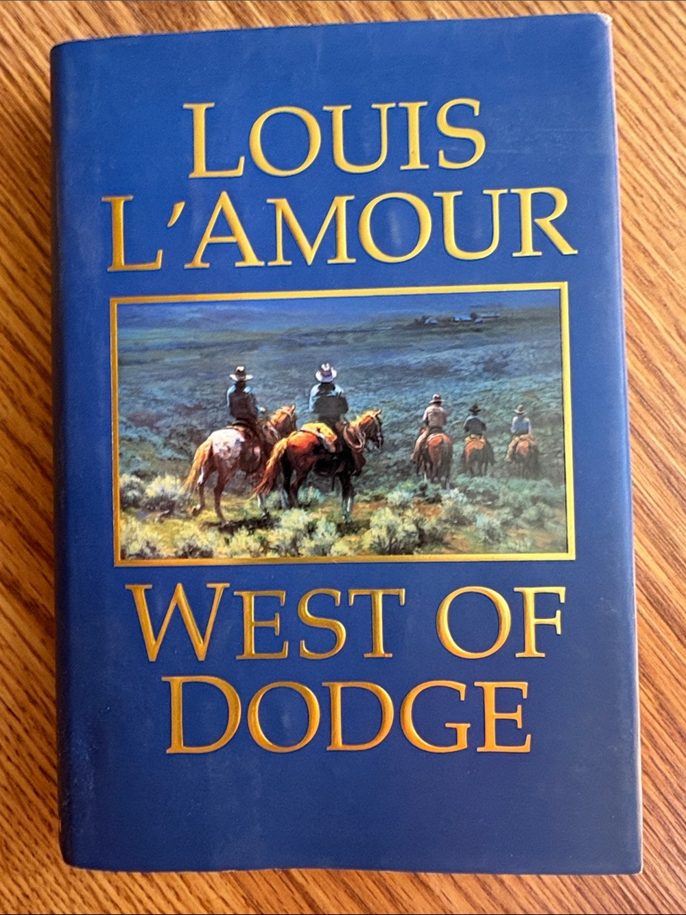 L'Amour Hardcover 'West of Dodge' in Blue with Gold Lettering